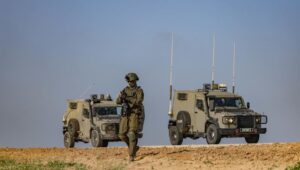 Israeli soldiers stand guard on the Israeli border with the Gaza Strip, on March 18, 2025. Photo by Chaim Goldberg/Flash90
