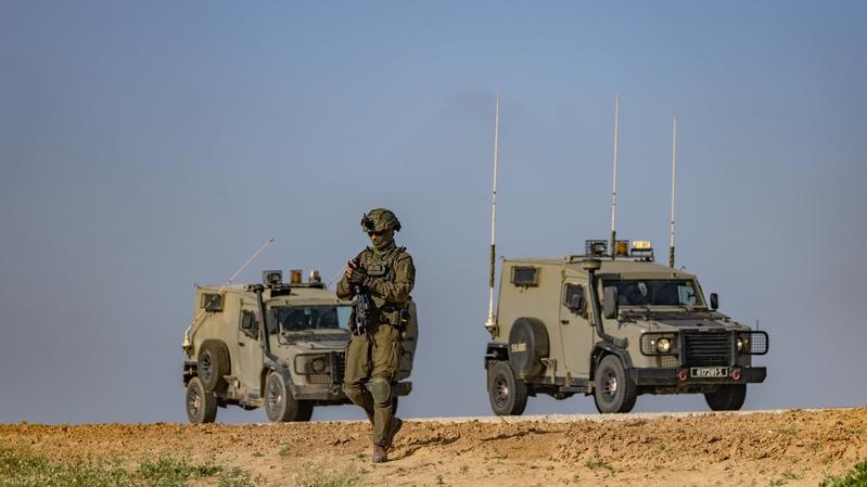 Israeli soldiers stand guard on the Israeli border with the Gaza Strip, on March 18, 2025. Photo by Chaim Goldberg/Flash90