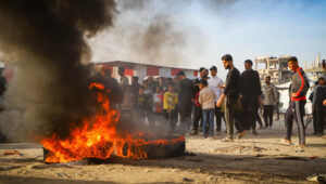 Palestinians take part in an anti-Hamas protest, calling to end the war with Israel, in Beit Lahia, in the northern Gaza Strip, March 26, 2025. Photo by Flash90