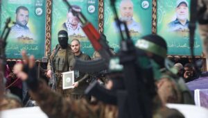 The handover of Israeli hostage Omer Wenkert to the Red Cross, as part of the ceasefire agreement between Israel and Hamas, in Nuseirat Camp in the central Gaza Strip, Feb. 22, 2025. Photo by Ali Hassan/Flash90.