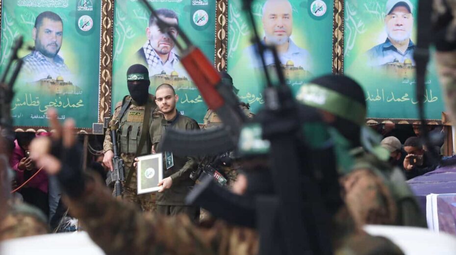 The handover of Israeli hostage Omer Wenkert to the Red Cross, as part of the ceasefire agreement between Israel and Hamas, in Nuseirat Camp in the central Gaza Strip, Feb. 22, 2025. Photo by Ali Hassan/Flash90.