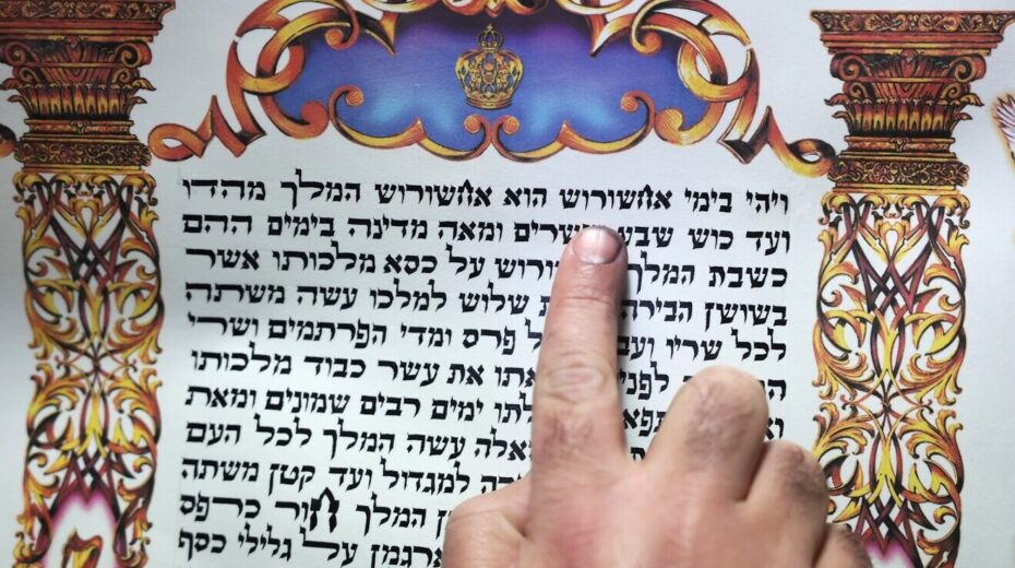 A “sofer” (Hebrew for “scribe”) writes the scroll of Esther for the Jewish holiday of Purim in the northern Israeli city of Safed on March 5, 2025. Photo by David Cohen/Flash90.