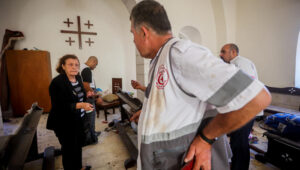 Palestinians at the Christian-run Al-Ahli Hospital in Gaza City on October 18, 2023, a day after an explosion that was falsely blamed on Israel. Photo by Atia Mohammed/Flash90