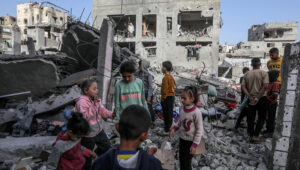 Palestinians at the site of an Israeli air strike in Khan Yunis, in the southern Gaza Strip, on April 2, 2025. Photo by Abed Rahim Khatib/Flash90