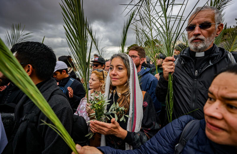 Christian pilgrims take part in the traditional Palm Sunday procession on the Mount of Olives on April 13, 2025, one week before Easter. Photo by Jamal Awad/Flash90
