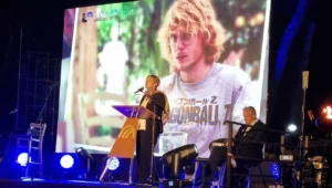 Iris Haim, the mother of Yotam Haim, addresses the Yom Hazikaron ceremony on Ammunition Hill, April 29, 2025. Photo by Sharon Altshul.