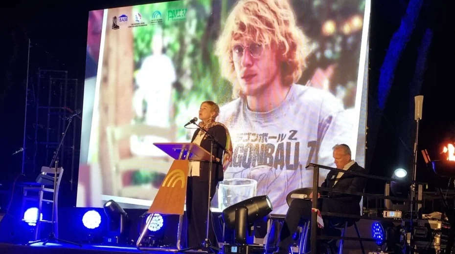 Iris Haim, the mother of Yotam Haim, addresses the Yom Hazikaron ceremony on Ammunition Hill, April 29, 2025. Photo by Sharon Altshul.
