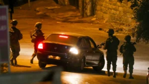 Israeli soldiers confiscate stolen cars from Palestinians in Hebron, Aug. 13, 2024. Photo by Wisam Hashlamoun/Flash90.