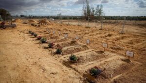 Graves of Israelis who were murdered by Hamas terrorists on Oct. 7, 2023, in Kibbutz Be'eri, Nov. 15, 2023. Photo by Chaim Goldberg/Flash90.