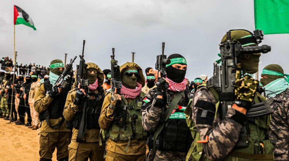 Hamas terrorists hand over the bodies of four Israeli hostages to the Red Cross in Khan Yunis on February 20, 2025. Photo by Abed Rahim Khatib/Flash90.