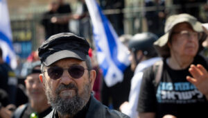 Former Israeli Prime Minister Ehud Barak participates in a protest against Israeli Prime Minister Benjamin Netanyahu's decision to dismiss Shin Bat Ronen Bar in front of the Prime Minister's Office in Jerusalem. March 19, 2025. Photo: Chaim Goldberg/Flash90