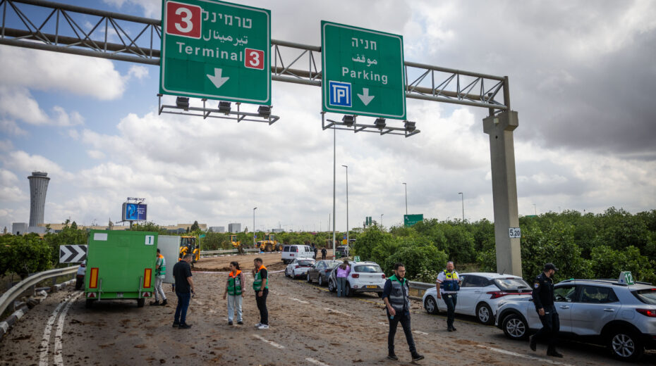 Israeli security forces at the site where a missile fired from Yemen landed near Ben Gurion Airport on May 4, 2025. Photo: Chaim Goldberg/Flash90
