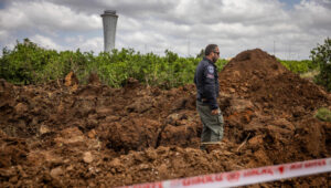 Israeli security forces at the site where a missile fired from Yemen hit an area of Ben Gurion Airport, May 4, 2025. Photo by Chaim Goldberg/Flash90