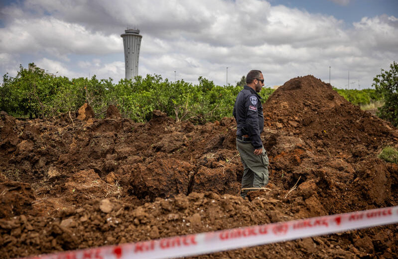 Israeli security forces at the site where a missile fired from Yemen hit an area of Ben Gurion Airport, May 4, 2025. Photo by Chaim Goldberg/Flash90