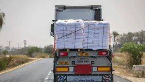 Trucks loaded with humanitarian aid on the Israeli side of the border before entering the Gaza Strip, May 19, 2025. Photo by Flash90.