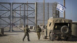 Israel Defense Forces soldiers near a Merkava tank in southern Israel, on the border with Gaza, on Nov. 11, 2024. Photo by Michael Giladi/Flash90.