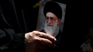 Photo of Iranian Supreme Leader Ayatollah Ali Khamenei during a demonstration. Photo: EPA-EFE/WAEL HAMZEH