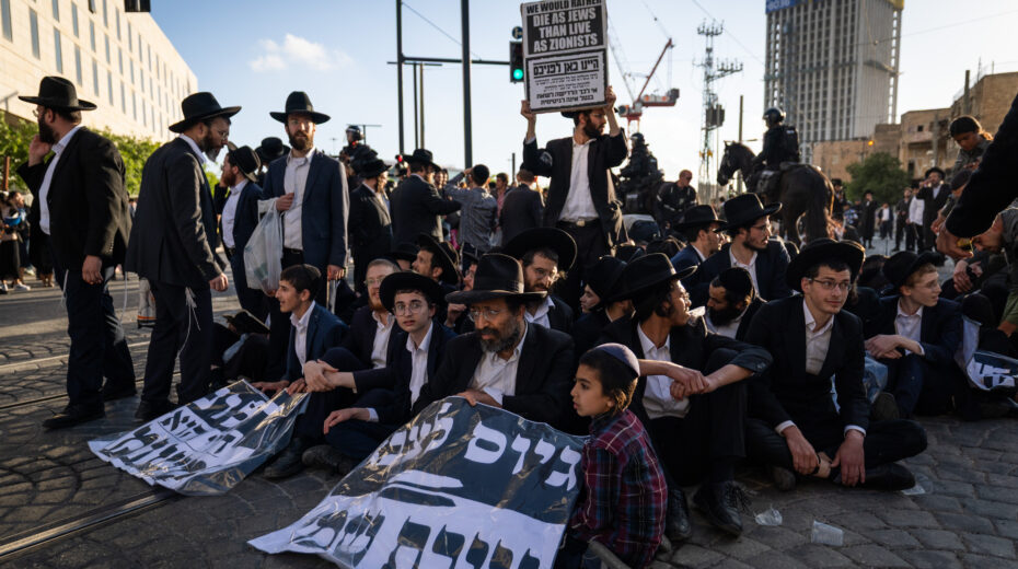 "We would rather die as Jews than live as Zionists" reads a protest poster, Jerusalem, May 2025. Photo: Chaim Goldberg/Flash90