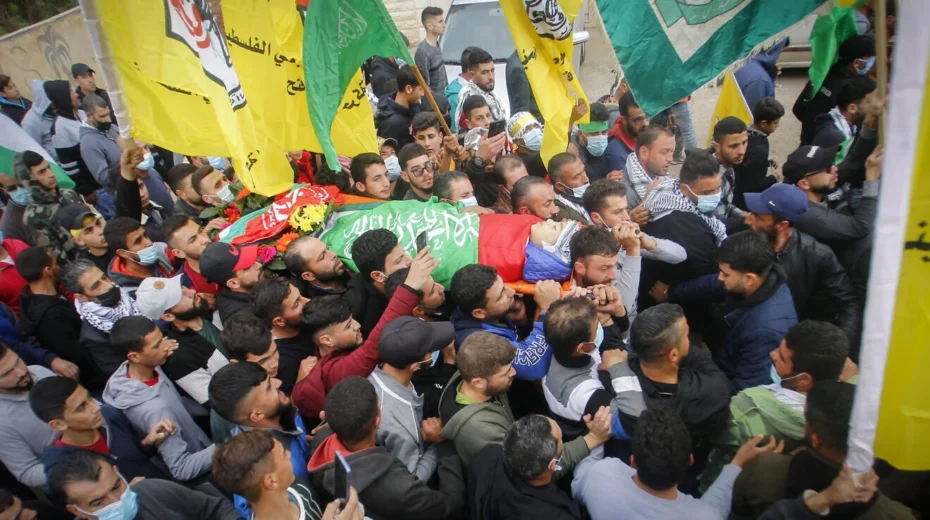 Palestinian terrorists at a funeral in Al-Mughayyir, near Ramallah in Samaria, Dec. 5, 2020. Photo by Nasser Ishtayeh/Flash90.