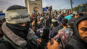 Illustration. Armed and masked Palestinians patrol the streets of Rafah in the southern Gaza Strip, March 1, 2024. Photo: Abed Rahim Khatib/Flash90