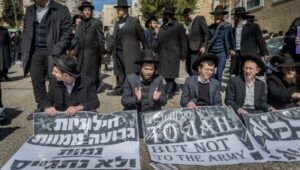 Ultra-Orthodox Jews protest against military conscription in front of an Israel Defense Forces recruitment center in Jerusalem, February 25, 2025. Photo: Chaim Goldberg/Flash90