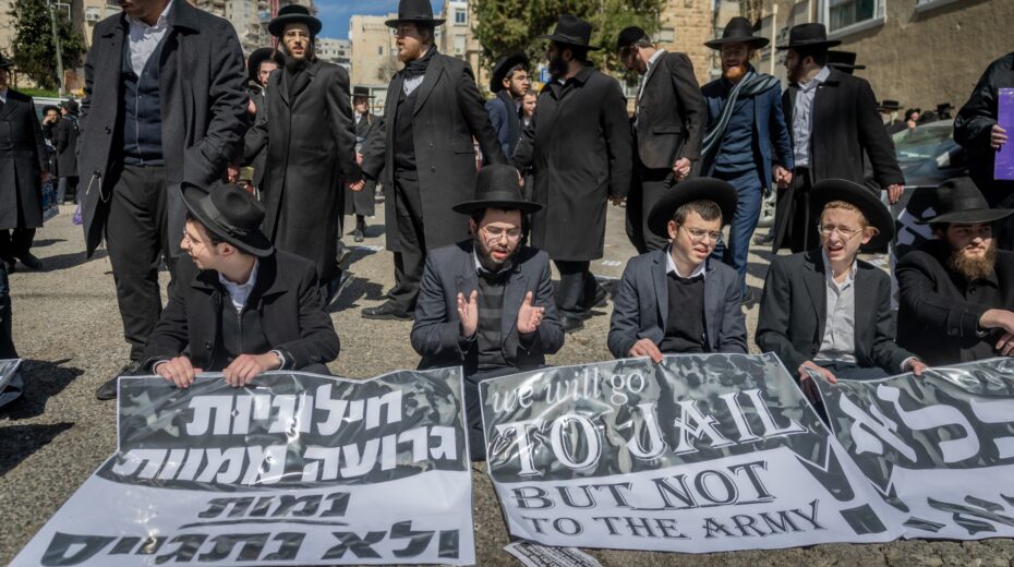 Ultra-Orthodox Jews protest against military conscription in front of an Israel Defense Forces recruitment center in Jerusalem, February 25, 2025. Photo: Chaim Goldberg/Flash90