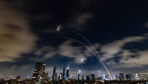 A missile defense system fires interceptor missiles when the missile alert was triggered, seen from Tel Aviv, June 18, 2025. Photo by Chaim Goldberg/Flash90