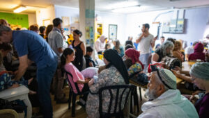 People in a public bomb shelter in Jerusalem as sirens warn of missiles fired from Iran, June 19, 2025. Photo: Noam Revkin Fenton/Flash90