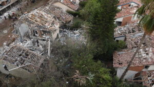 Rescue teams inspect the damage to buildings struck by an Iranian ballistic missile in Tel-Aviv, Israel, on June 22, 2025. Photo by Gili Yaari / Flash90