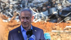 Israeli Prime Minister Benjamin Netanyahu visits the scene where a ballistic missile fired from Iran hit and caused damage at the Weizmann Institute in Rehovot, June 20, 2025. Credit: Itai Ron/POOL.