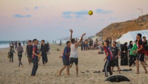 Gaza residents enjoy the sea on a hot day in Gaza City, July 4, 2025. Photo: Ali Hassan/Flash90.