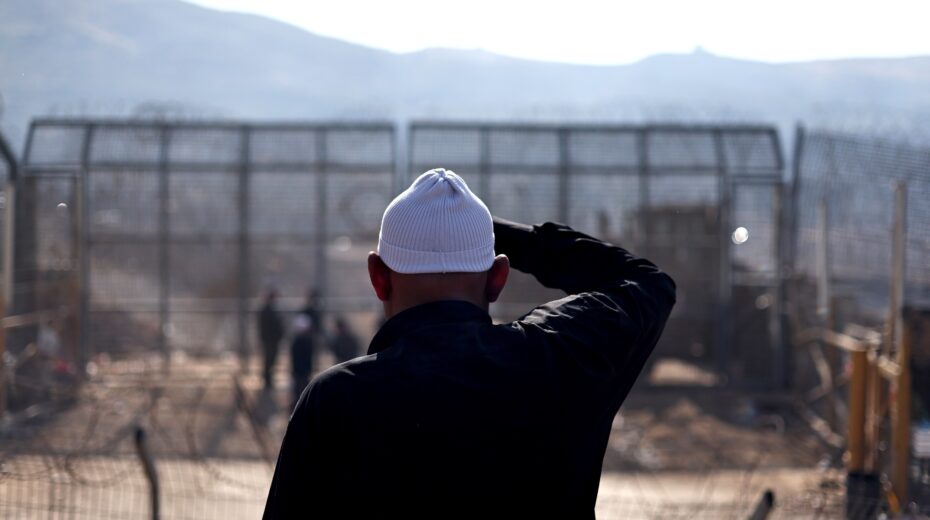 A Druze man looks at the gate at the ceasefire line between the Golan Heights and Syria near the predominantly Druze village of Majdal Shams in the Golan Heights, July 17, 2025. EPA/ATEF SAFADI.