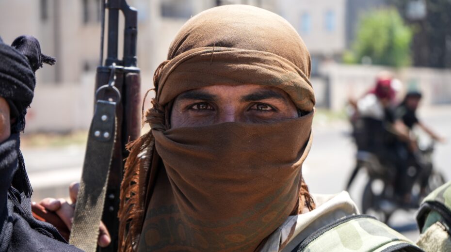 An armed fighter in Syria—many of them are foreign jihadists with radical ideologies. Photo: EPA/AHMAD FALLAHA.