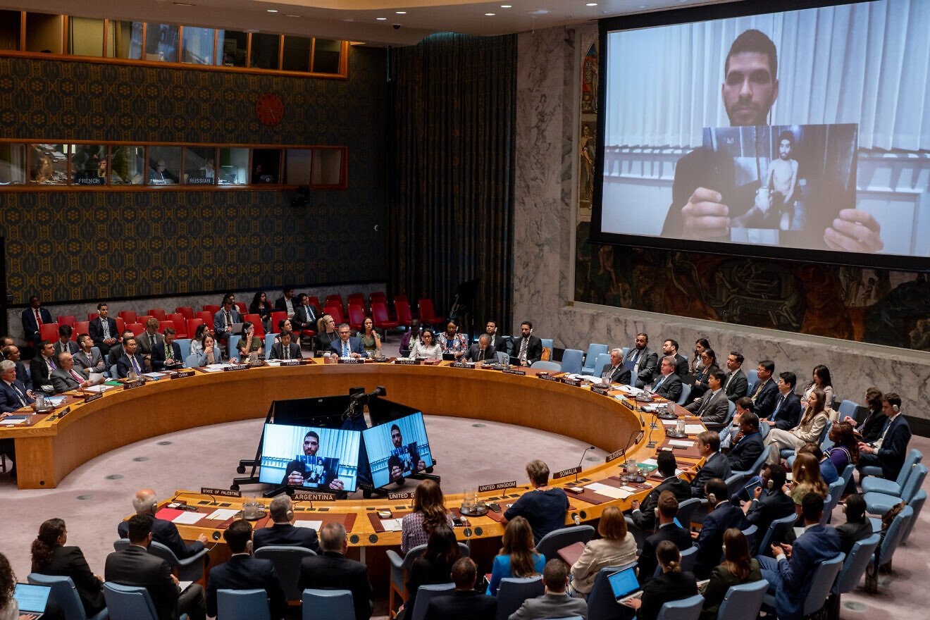 Ilay David, brother of hostage Evyatar David, speaks on a screen during a meeting at United Nations headquarters in New York City on the medical condition of hostages held in the Gaza Strip, Aug. 5, 2025. Credit: Liri Agami/Flash90.