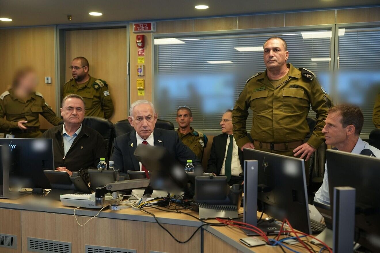 From left, Defense Minister Israel Katz, Prime Minister Benjamin Netanyahu and IDF Chief of Staff Lt. Gen. Eyal Zamir monitor the attack on Houthi targets in Yemen from the "pit" at the Kirya military headquarters in Tel Aviv, Aug. 24, 2025. Credit: Israeli Defense Ministry.