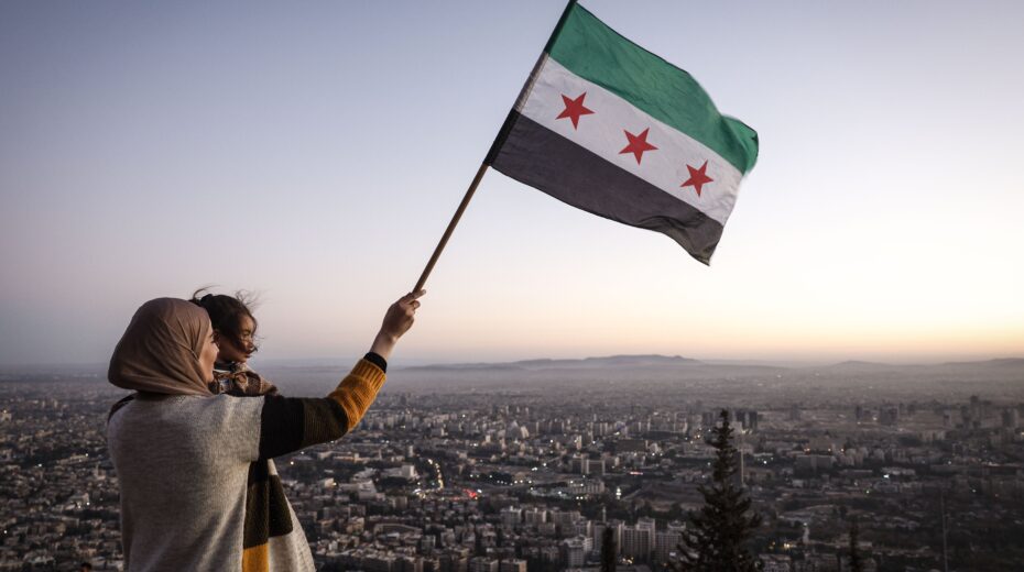 A mother and daughter admire the view from Mount Qasioun with the new Syrian flag in Damascus, Syria, December 19, 2024. Syrian rebels marched into Damascus on December 8, 2024, and announced in a televised address the "liberation of the city of Damascus and the overthrow of Bashar al-Assad," as well as the release of all prisoners. EPA/ANTONIO PEDRO SANTOS