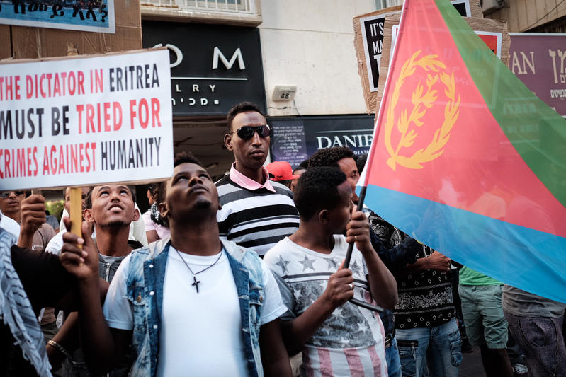 Eritrean migrants protest in front of the European Union embassy in Ramat Gan, near Tel Aviv, calling for the EU to try the Eritrean leadership for crimes against humanity, on June 21, 2016. Photo by Tomer Neuberg/Flash90