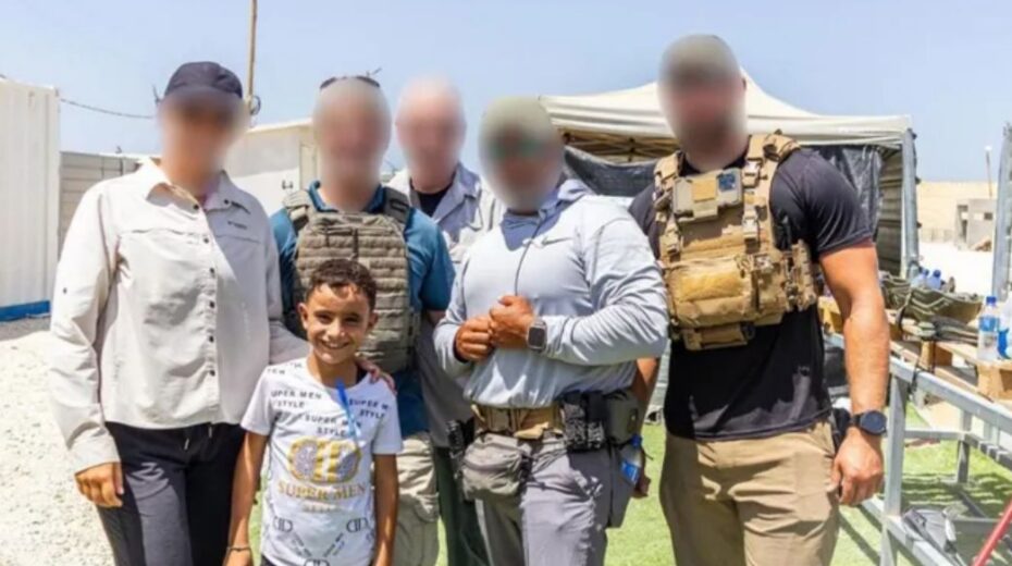 The young Abed al-Rahim "Aboud" Mohammed Hamdan with staff of the Gaza Humanitarian Foundation (GHF). Photo: GHF