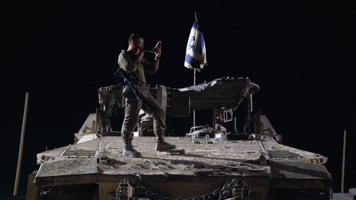 An Israeli soldier sounds the shofar in Gaza. Photo: IDF Spokesman