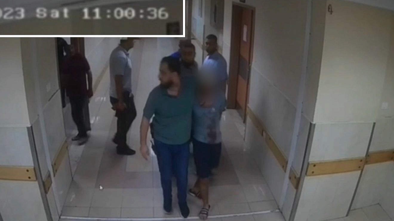 A photo of the hostages being moved inside the Shifa Hospital. Source: IDF Spokesperson's Department.