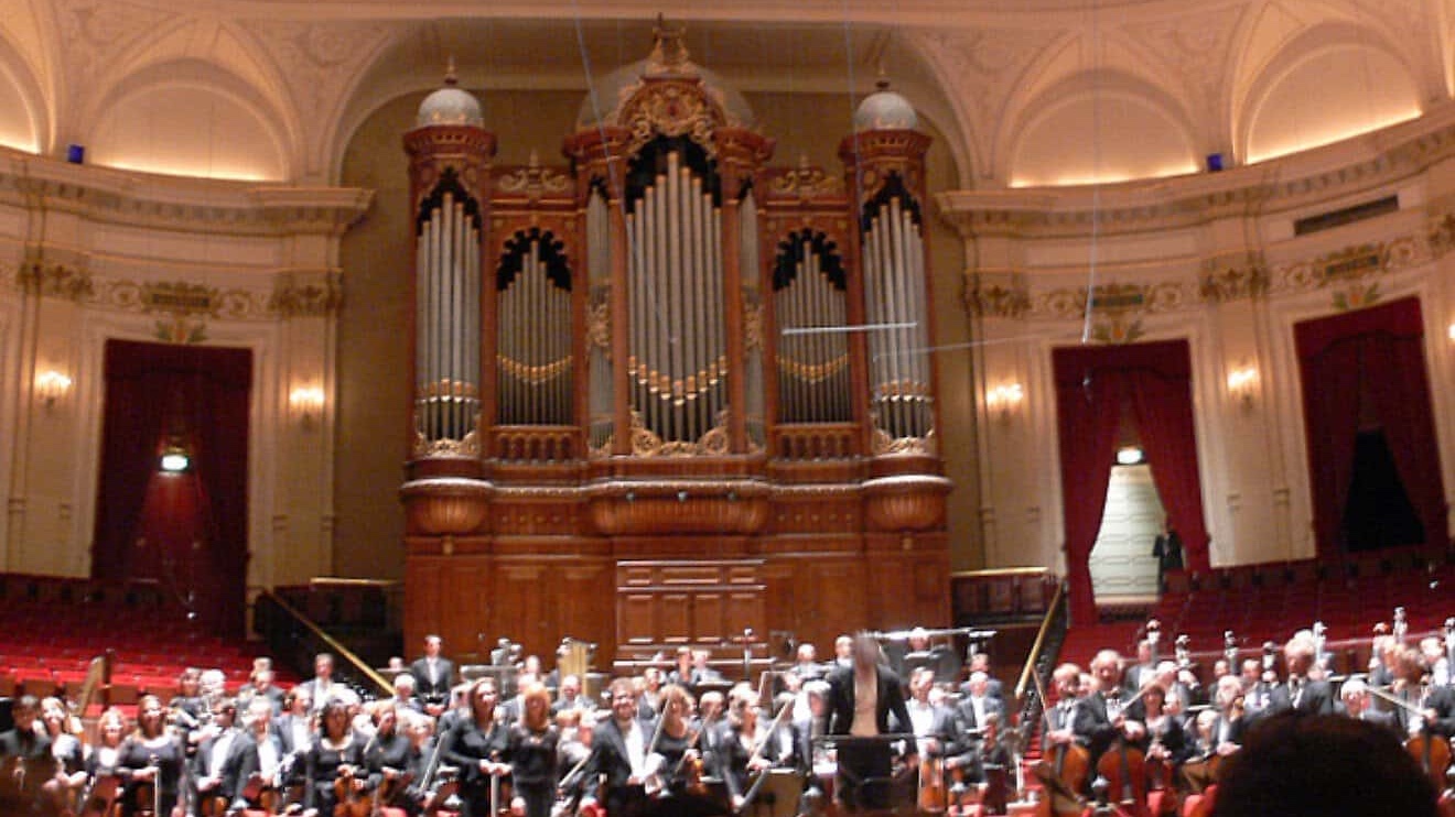 Musicians peform at the Royal Concert Hall in Amsterdam, the Netherlands in 2008. Photo credit: Wikimedia Commons/Andreas Praefcke.