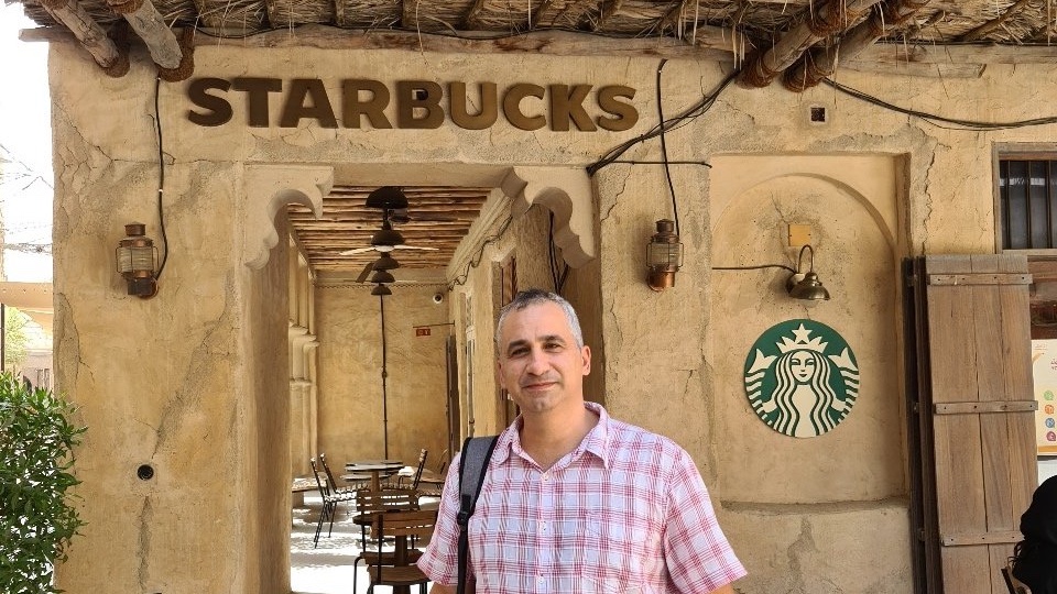 Israel Today correspondent Edy Cohen at a Starbucks in Dubai. Photo: Edy Cohen