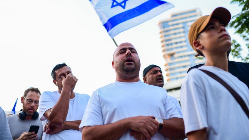 Israelis protest an attempt by the Tel Aviv Municipality to ban prayers in public spaces during Jewish holidays by holding a mass public prayer. Tomer Neuberg/Flash90
