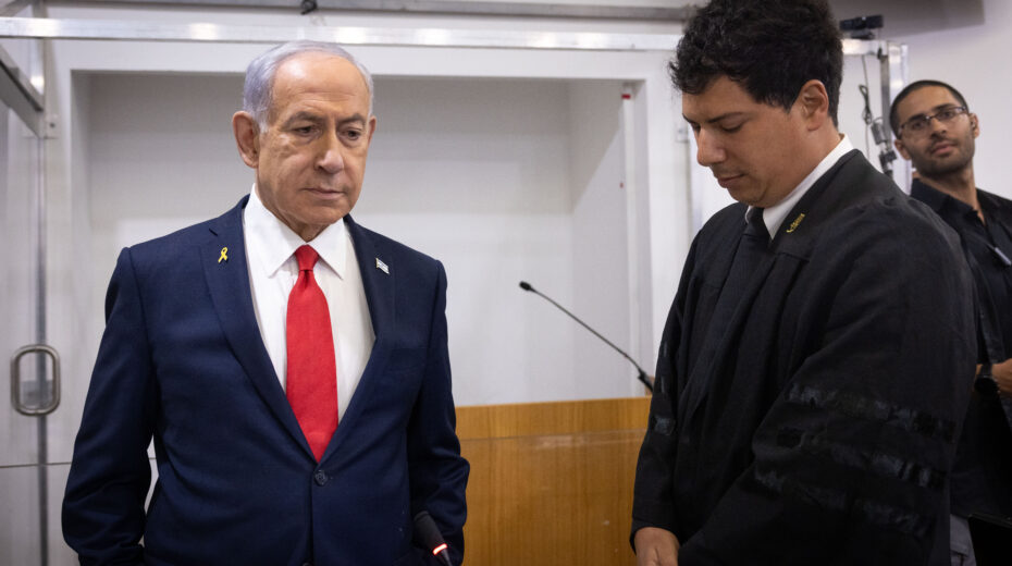 Israeli Prime Minister Benjamin Netanyahu enters the Tel Aviv District Court courtroom before the start of his testimony in his trial on October 28, 2025. Photo: Miriam Alster/Flash90