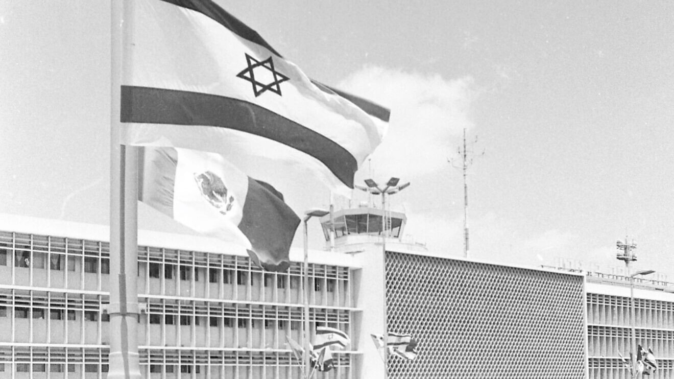 National flags welcomed a delegation of U.S. senators who came to Israel in 1975, the year that the U.N. General Assembly vote to adopt Resolution 3379. Credit: Dan Hadani Collection/The Pritzker Family National Photography Collection at the National Library of Israel via Wikimedia Commons.