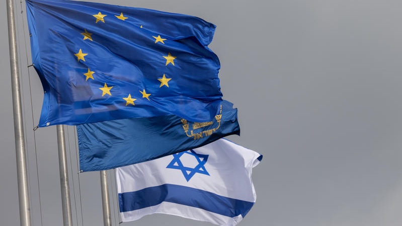 The Israeli and European Union flags outside the Knesset during the official visit of President of the European Parliament Roberta Metsola. February 13, 2025. Photo by Chaim Goldberg/Flash90