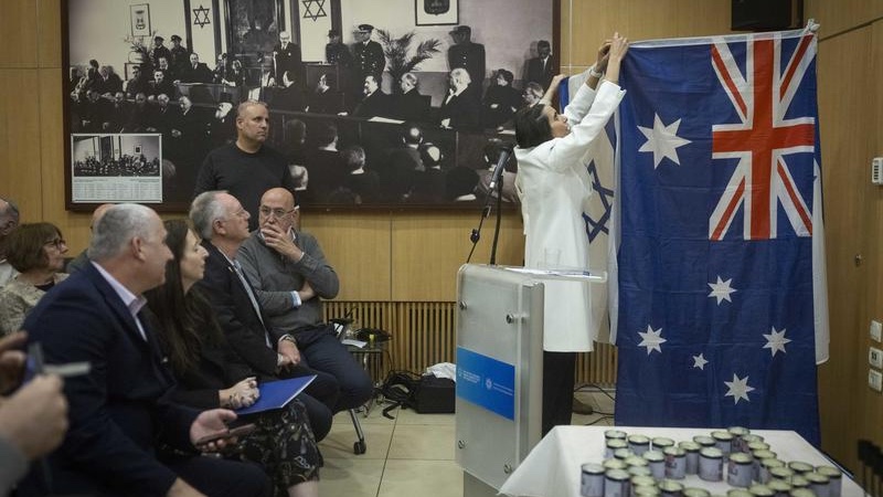 People attend a ceremony in memory of the victims of the mass shooting attack in Sydney targeting the Jewish community during Hanukkah celebrations, at the World Zionist Organization (WZO) building, December 15, 2025. Photo by Chaim Goldberg/Flash90