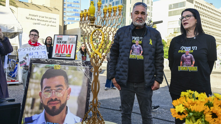 Relatives, friends, and supporters of Ran Gvili, whose body is being held by Hamas, participate in a Kabbalat Shabbat ceremony and the lighting of Hanukkah candles on Hostage Square in Tel Aviv on December 19, 2025. Photo: Avshalom Sassoni/Flash90