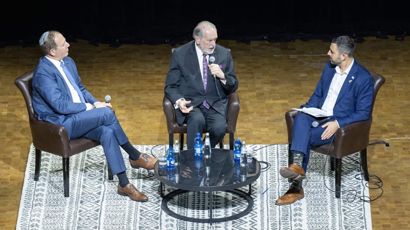 From left, Doron Spielman, vice president of the City of David Foundation; U.S. Ambassador Mike Huckabee; and former Israeli government spokesman Eylon Levy at the National Library of Israel in Jerusalem on Dec. 9, 2025. Photo by Matt Kaminsky/JNS.