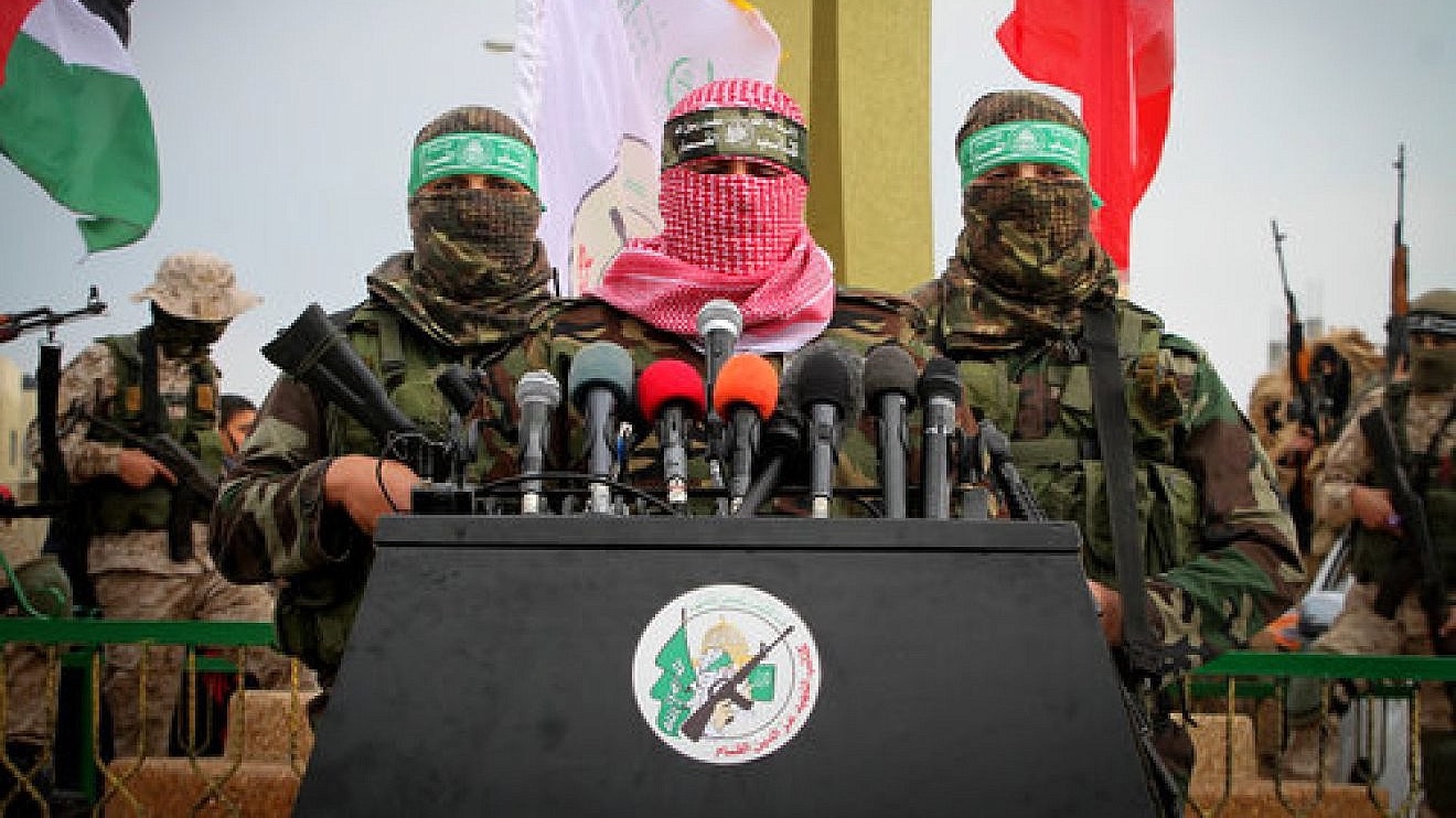 Abu Ubaida (center), a spokesman for Hamas’s military wing, speaks in the southern Gaza town of Rafah on Jan. 31, 2017. Credit: Abed Rahim Khatib/Flash90.